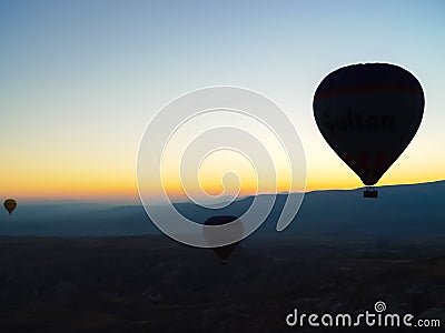 Silhouette of hot air balloons flying over the Cappadocia valley Editorial Stock Photo