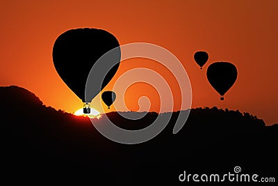 Silhouette of hot air balloons. Stock Photo