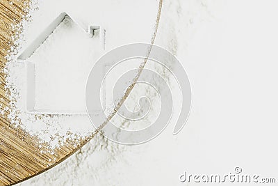 Silhouette of a house on flour for baking Stock Photo