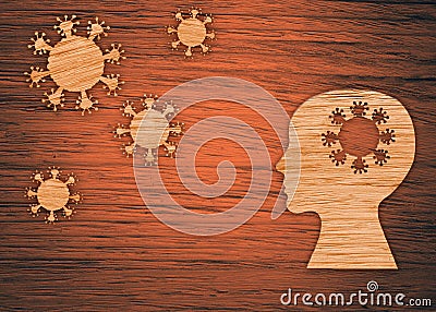 The silhouette of a human head, the virus on a brown background. The epidemic of the coronavirus, pandemic Stock Photo