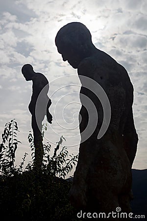 Silhouette of human statues of stone Editorial Stock Photo