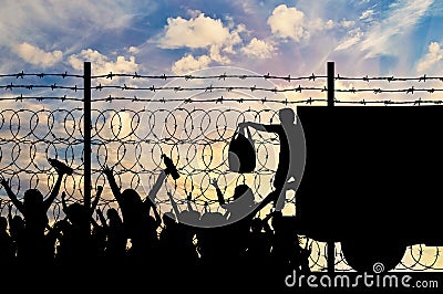 Silhouette of humanitarian assistance to refugees Stock Photo