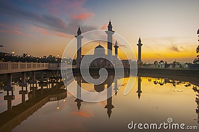 The silhouette image of sunset at mosque. Stock Photo