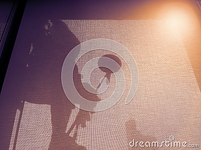 Silhouette images of man cleaning the window office building Stock Photo