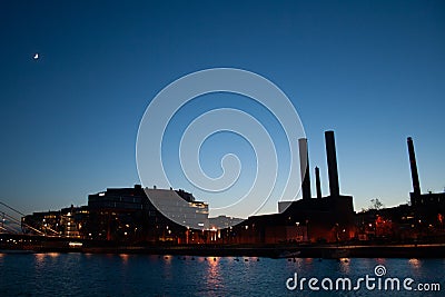 Silhouette of industrial landscape with chimneys tank Editorial Stock Photo