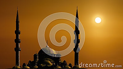 Silhouette islamic mosque with dome and two tower with background of sunrising Stock Photo