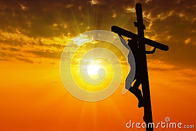 Silhouette Jesus Christ crucifixion on cross Stock Photo