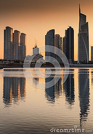 Silhouette of Jumeirah lakes towers at dusk, Dubai, United Arab Stock Photo