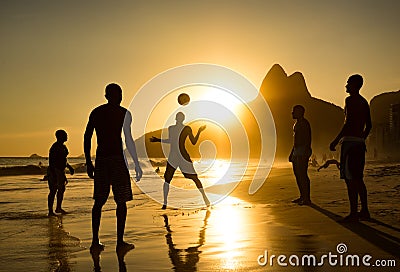 Silhouette of Locals Playing Ball at Sunset in Ipanema Beach, Rio de Janeiro, Brazil Editorial Stock Photo