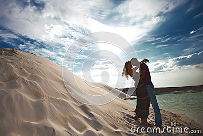 Silhouette loving couple on beach Stock Photo