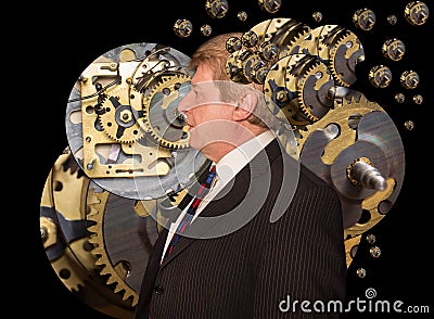 Silhouette of a man with a brain made up of gears or cogs machine parts workings Stock Photo