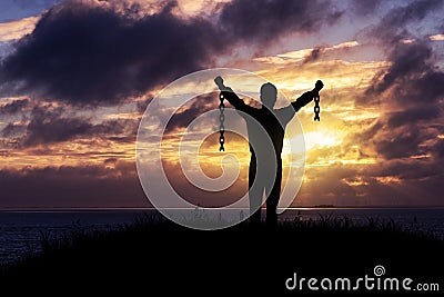 Man with broken chains Stock Photo