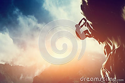 A silhouette of man climbing on rock, mountain Stock Photo