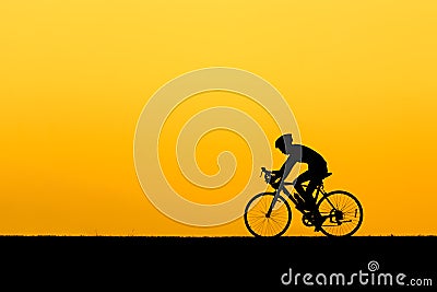 A Silhouette of man cycling Stock Photo