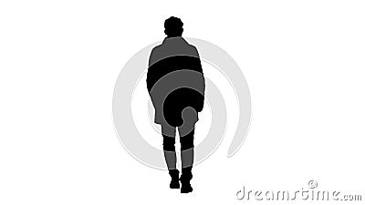 Silhouette Man with dark beard in light trench coat walks. Stock Photo