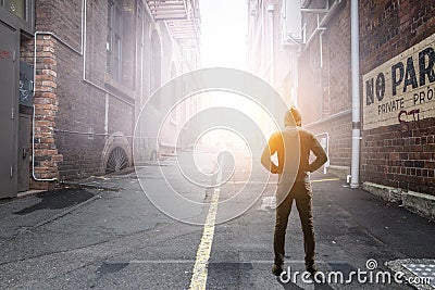 Silhouette of man in hoody Stock Photo