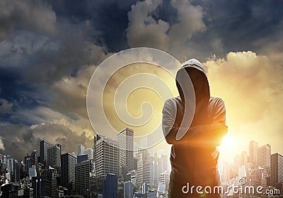 Silhouette of man in hoody Stock Photo