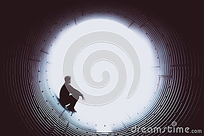 Silhouette of a man looking pensively at the edge of a tunnel through a white void. Space to place text. Concept Stock Photo