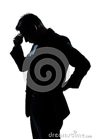 Silhouette man portrait thinking looking down Stock Photo