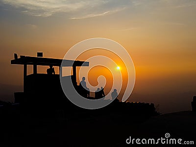 Silhouette of military post on mountain peak against sunset Editorial Stock Photo