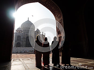 Silhouette morning of indian people at Taj Mahal. Editorial Stock Photo