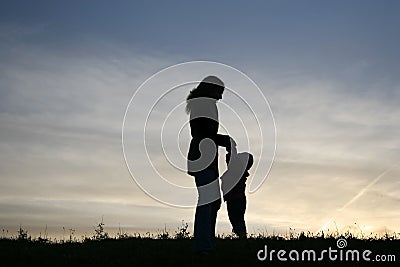 Silhouette mother with baby Stock Photo