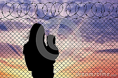 Silhouette mother with child refugees Stock Photo