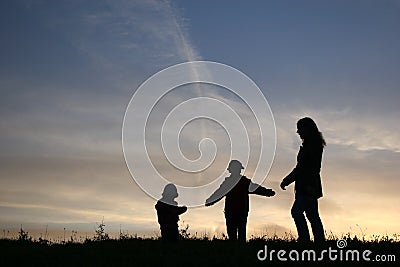 Silhouette mother with children Stock Photo