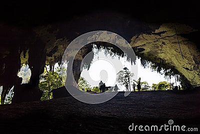 Silhouette of people at Great Cave chamber, Mulu National Park Editorial Stock Photo