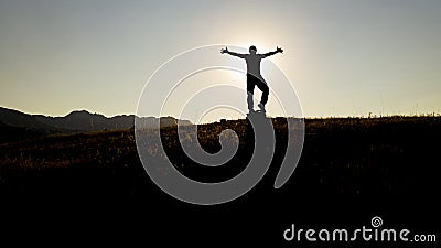 silhouette of a person with success, determination and fighting spirit Stock Photo