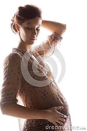 Silhouette picture of pregnant beautiful woman Stock Photo