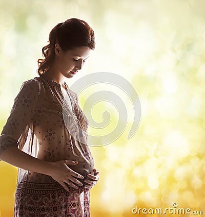 Silhouette picture of pregnant beautiful woman Stock Photo