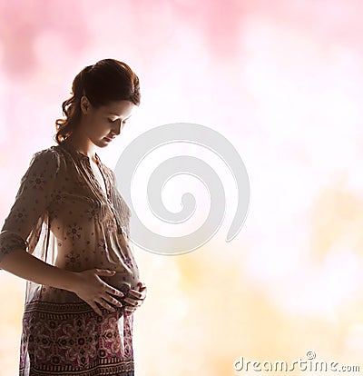 Silhouette picture of pregnant beautiful woman Stock Photo