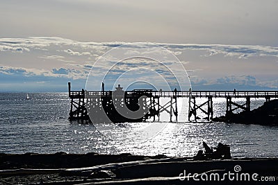 The silhouette of the pier. Stock Photo
