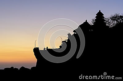 Silhouette of pura tanah lot hindu temple and sunset sky in bali Stock Photo
