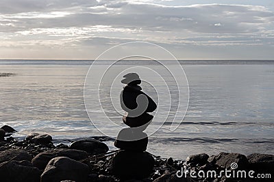 silhouette of a pyramid of stones Stock Photo