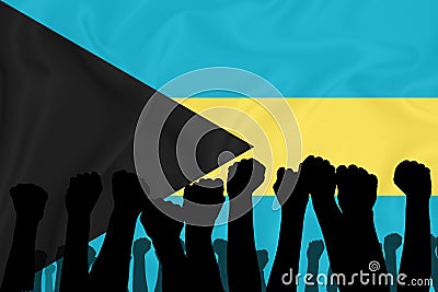 Silhouette of raised arms and clenched fists on the background of the flag of Bahamas. The concept of power, conflict. With place Stock Photo