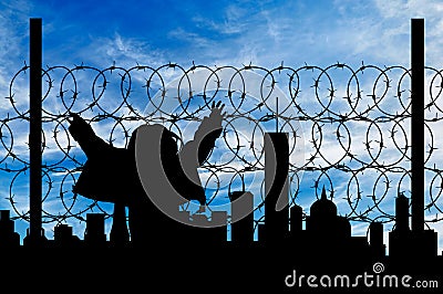 Silhouette refugee fence Stock Photo