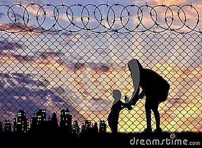 Silhouette refugee mother with a baby Stock Photo