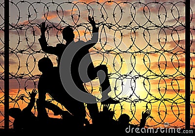 Silhouette of refugees crossing the border illegally Stock Photo
