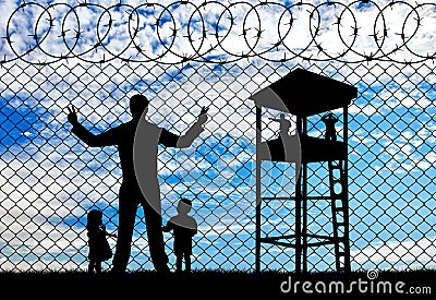 Silhouette refugees father and two children Stock Photo