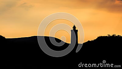 Silhouette of Rubjerg Knude Lighthouse Stock Photo