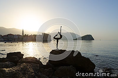 Silhouette of sculpture Ballerina Dancer from Budva in morning backlight Editorial Stock Photo