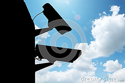 Silhouette of security cctv camera Stock Photo
