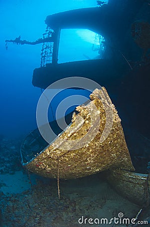 Silhouette of shipwreck with lifeboat Stock Photo