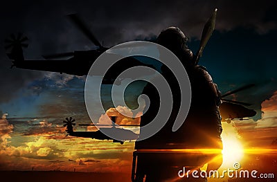 Silhouette soldier at sunset Stock Photo