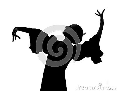 Silhouette of Spanish woman Flamenco dancer dancing Sevillanas Stock Photo