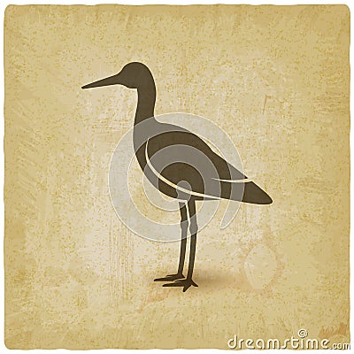 Silhouette of standing stork on vintage background Stock Photo