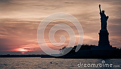 Silhouette of the statue of liberty, New York City Stock Photo