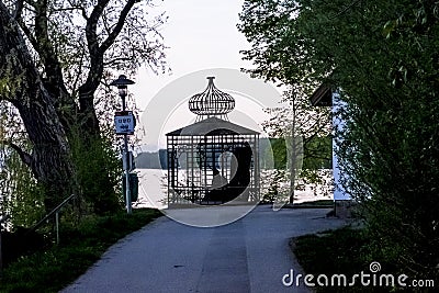 Silhouette of a steel frame gazebo structure at Lake Starnberg Munich Germany Editorial Stock Photo